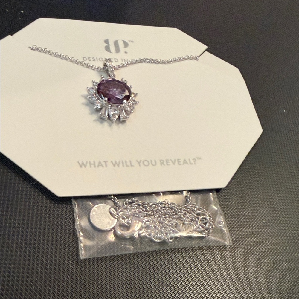 Dazzling Silver Necklace with Purple Gemstone